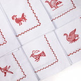 Parandeh Napkins in Rust on Cream